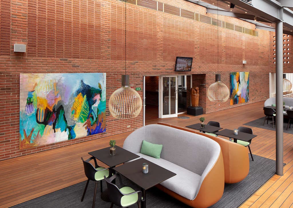 Painting by Svend Kindt-Larsen installed in a space